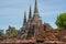 View to Wat Phra Si Sanphet temple in Ayutthaya historical park and temple bricks wall ruins remains, Ayutthaya, Thailand