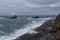 View to waves and Los Galiones cliff near Roque de Las Bodegas beach in the area of Taganana, Tenerife Island,  Spain