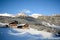 View to a winter landscape with old farmhouse and mountain range, Gasteinertal valley near Bad Gastein, Pongau Alps - Salzburg Aus