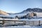 View to a winter landscape with wooden fence, Gasteinertal valley near Bad Gastein, Pongau Alps - Salzburg Austria