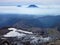 View of tolhuaca and lonquimay volcano peaks from sierra nevada in chile