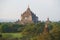 View of top of the ancient Buddhist temple Thatbyinnyu Phaya on the beginning of evening. Old Bagan, Myanmar