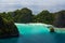View from the top of the cliff at remote archipelago Pulau Wayag, Raja Ampat, Indonesia