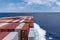 View on the top of containers loaded on deck of the large cargo ship.