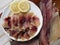 The view from the top.Fish background. Pieces of freshly salted Russian river fish, ready to eat, on the kitchen cutting Board on