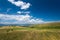 View from the top of a hill, small hungarian village in the valley in Transylvania, Romania