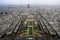 View from the top level of the Eiffel Tower, down the Champ de Mars, with the Tour Montparnasse in rainy day, Paris, Fra