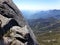 View from the Top of Moro Rock with its solid rock texture, overlooking mountains and valleys - Sequoia National Park