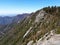 View from the Top of Moro Rock with its solid rock texture, overlooking mountains and valleys - Sequoia National Park