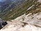 View from the Top of Moro Rock with its solid rock texture, overlooking mountains and valleys - Sequoia National Park