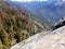 View from the Top of Moro Rock with its solid rock texture, overlooking mountains and valleys - Sequoia National Park