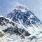 View of top of Mount Everest with clouds and snowfall