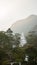 The view on top of the mountain Adam`s Peak on sunset buddha temple. Sri Lanka