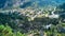 View at top of mountain behind Box Canon sign overlooking mountain town