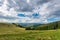 View from the top of the mountain, small hungarian village in the valley in Transylvania