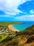 View from the top of The Nut in Stanley Tasmania blue ocean and clouds