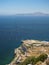 View from the top of the Rock of Gibraltar across the Strait of Gibraltar with passing container ship