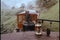 View from top of steam locomotive traveling through countryside