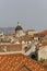 View from the top of town walls of Dubrovnik roofs, with Cathedral dome