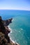 View from the top of the wall of Alanya fortress to surrounding cliffs and rocks and azure mediterranean sea