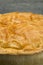 View of Top of Whole Meat Pie with Copy Space