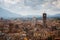 View of Torre Delle Ore from top of Guinigi Tower, Lucca, Tuscany, Italy. Scenic city panoramic overview picturesque travel