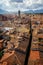 View of Torre Delle Ore from top of Guinigi Tower, Lucca, Tuscany, Italy. Scenic city panoramic overview picturesque travel