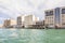 View from the tourist Arab boat abra on the embankment of Dubai Creek in Dubai city, United Arab Emirates