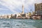 View from the tourist Arab boat abra on the embankment of Dubai Creek in Dubai city, United Arab Emirates