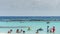 View of Tourists enjoying Baby beach on Aruba