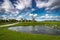 View towards Collection of old windmills at Angla Windmill Hill on a sunny day with blue sky and clouds in Saaremaa