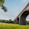 A view towards the final section of the western end of the Harringworth railway viaduct, the longest masonry viaduct in the UK