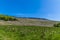 A view towards the highest part of the escarpment of Stanage Edge in the Peak District, UK