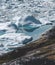 View towards Icefjord in Ilulissat. Icebergs from Kangia glacier in Greenland swimming with blue water. Symbol of global
