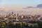 View towards London city skyline at sunset from Hampstead Heath