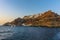 A view towards Oia and Amoudi Bay, Santorini as the sun sets