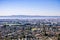 View towards the towns of east bay; San Mateo bridge on the background, San Francisco bay area, Hayward, California