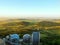 View from tower of meteorological observatory with many parabolic satellites to morning countryside. Spring morning
