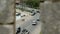 View from the tower on the road with traffic jams and people on the sidewalk