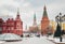 View of the towers of the Moscow Kremlin and the building of the historical Museum in Moscow at Christmas in winter, cityscape