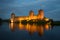 View of the towers of the Olavinlinna fortress in the august twilight. Savonlinna