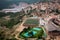 View of the town of Cardona from the castle hill. Salt mountain, football field, swimming pool