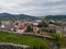 View of the town of Doboj and the hilly countryside from the Gradina fortress on the hill above the town during a cloudy summer