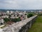 View of the town of Doboj and the hilly countryside from the Gradina fortress on the hill above the town during a cloudy summer