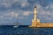 View of the town lighthouse, yacht and the sea