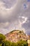 A view of the town Rocca di Papa in Lazio, Italy with dark cloud