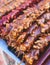 View of traditional armenian local candy sweets delights with churchkhela, sweet sausage, sudzhuk, dried fruits, walnuts and