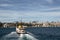 View of traditional ferry boat on Bosphorus and European side of Istanbul.