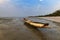View of a traditional fishing canoe at the beach in the island of Orango at sunset, in Guinea Bissau.