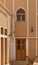 View of traditional Persian doors and windows on the walls of an old house in Yazd, Yazd has a unique Iranian architecture.